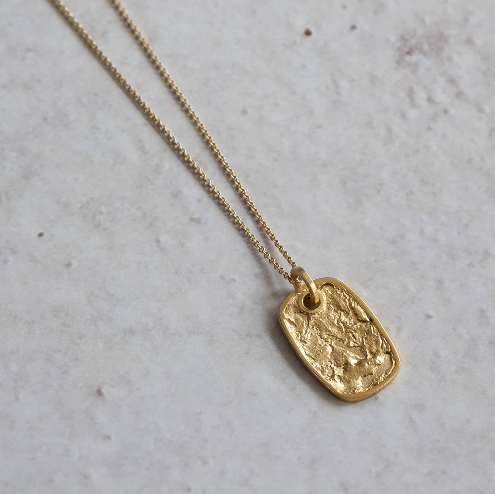 Continent Tag 14kt Gold